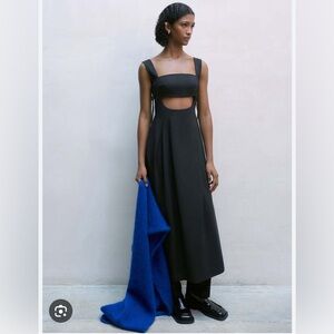 Cordera tailoring cut out dress. Super cute that can be dressed up or down.